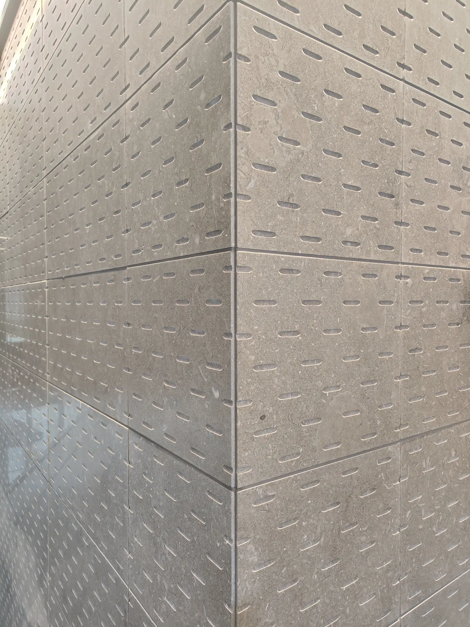 Lithos_Grigio_Olivo_limestone_Italy_Ermes_Interior_Cladding